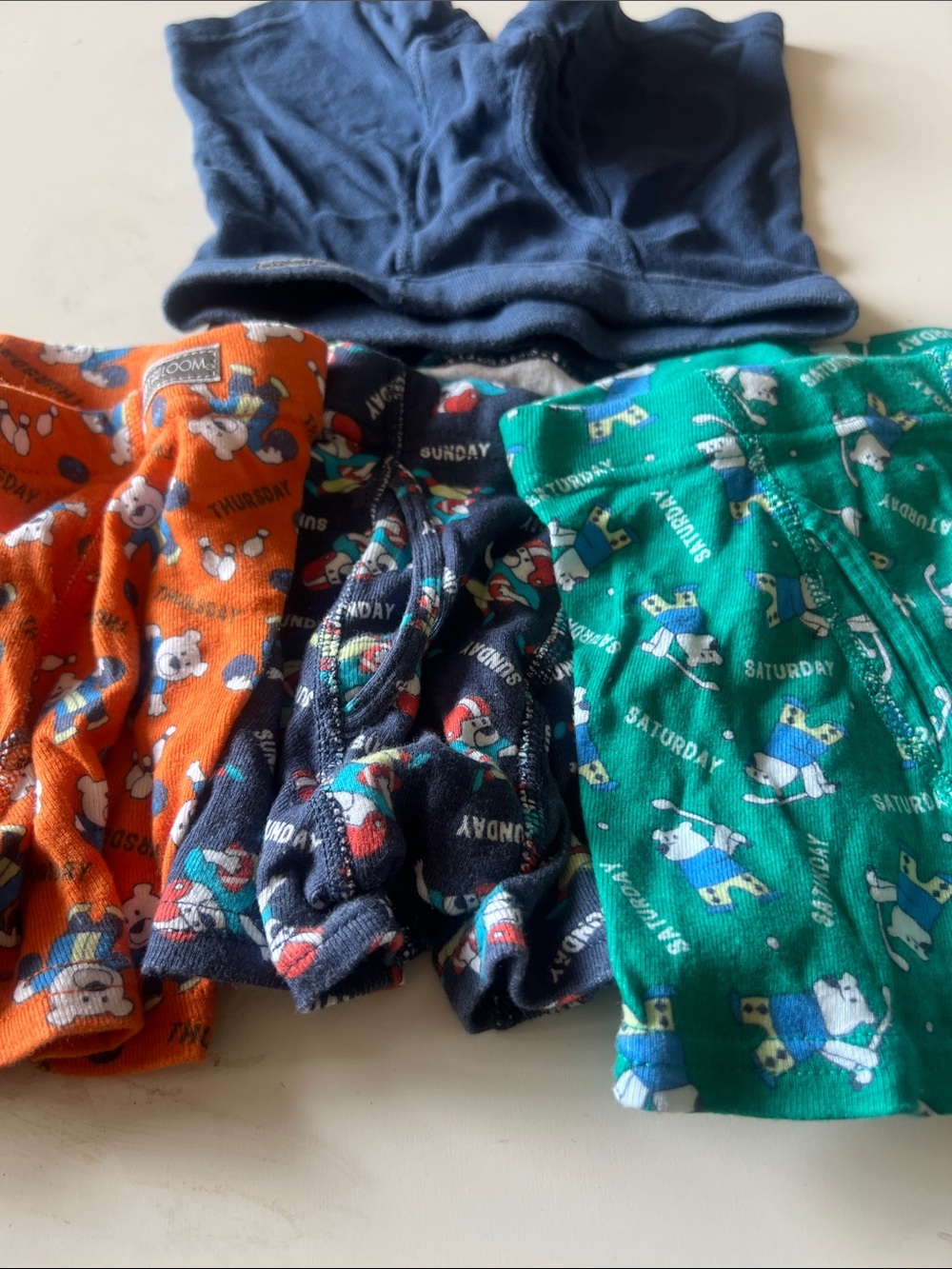 Hanna Andersson Boys 4-Pack Boxer Briefs in Navy, Orange, Green